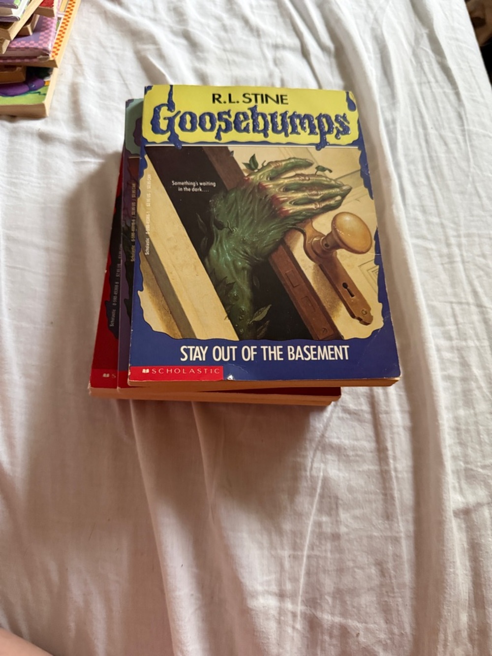 Scholastic Goosebumps Paperback - Yellow and Blue Illustrated Cover